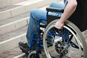 Wheelchair approaching stairs